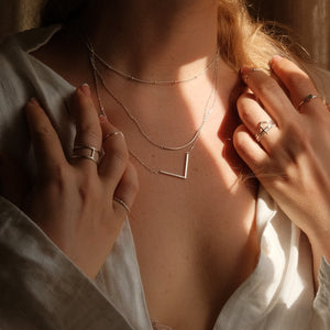 Unveiling the Timeless Elegance of Bar Necklaces